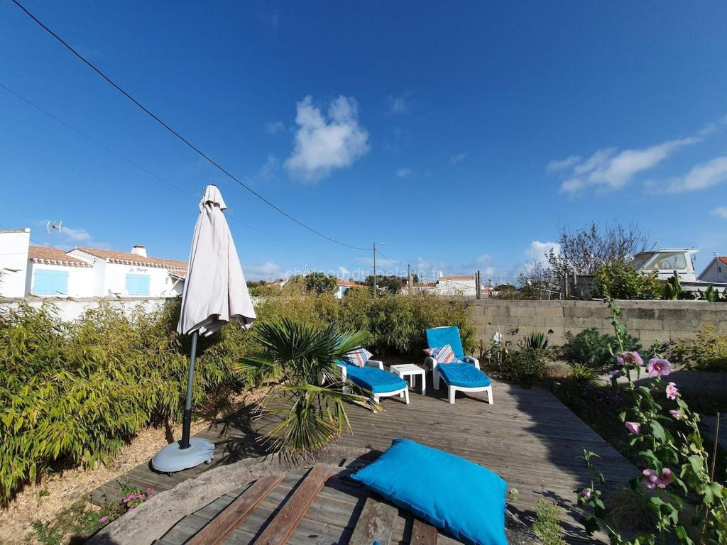 Photo de charmante maisonnette a 400m de la plage