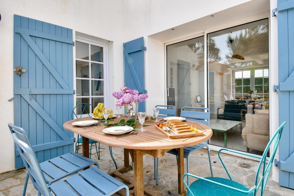 Photo de À 220m de la plage, maison avec jardin pour 4