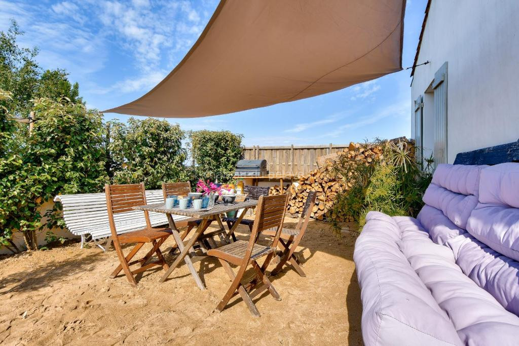 Photo de Maison pour 6 à Noirmoutier - jardin - terrasse